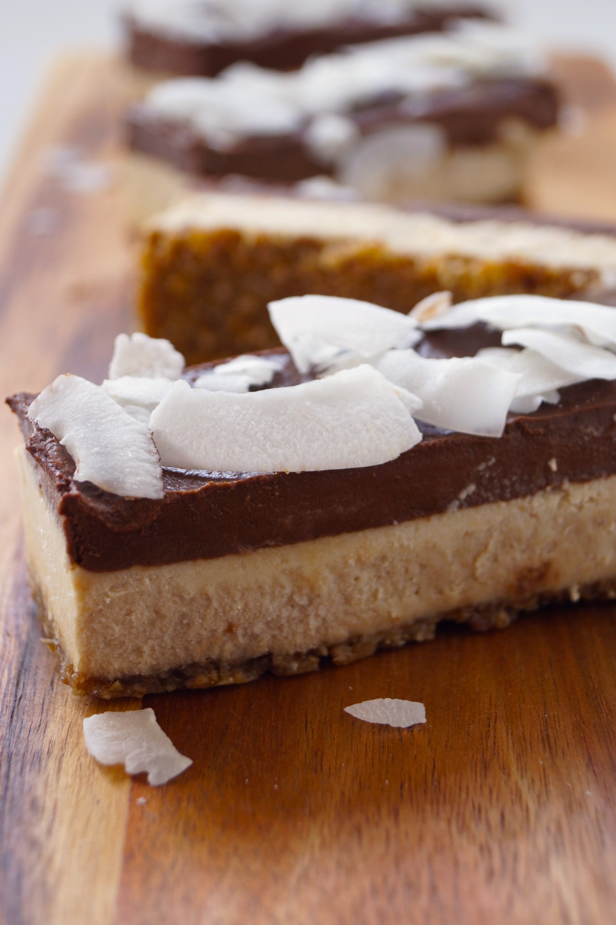 Decadent 3-layer Chocolate-Coconut-Cheesecake Bars