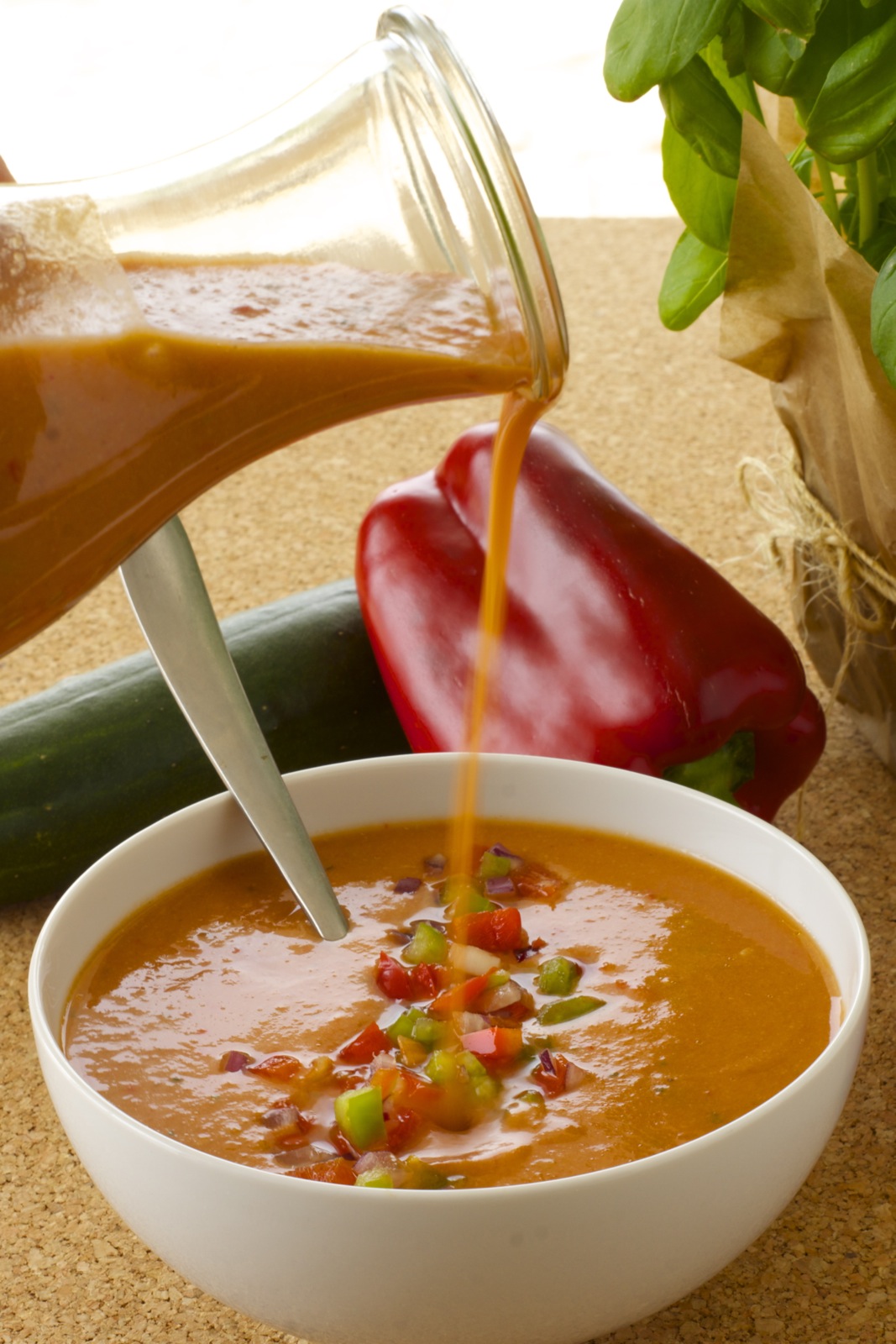 Pouring a bowl of Gazpacho