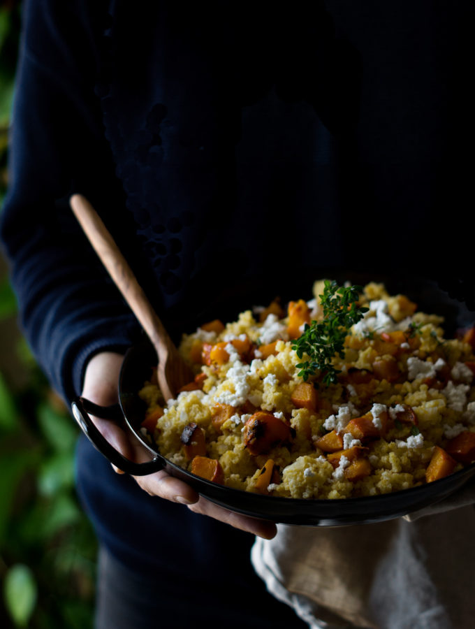 A baking tin full of roasted pumpkin & millet risotto