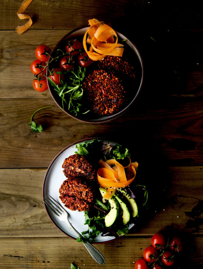 Two bowls of salad with Beetroot Buckwheat Patties