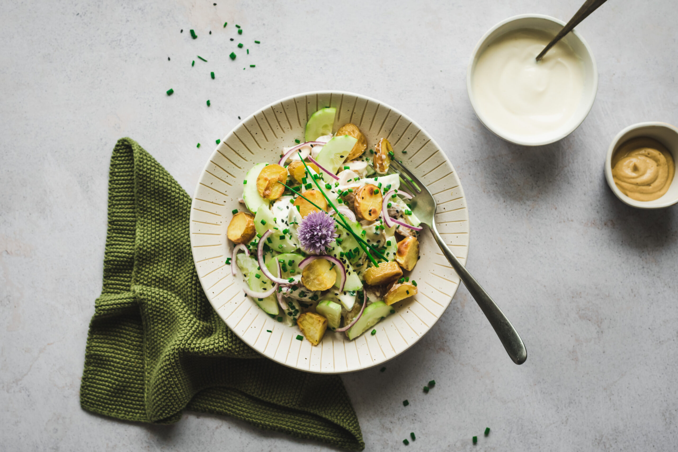 A simple roasted potato cucumber salad with greek yoghurt dressing