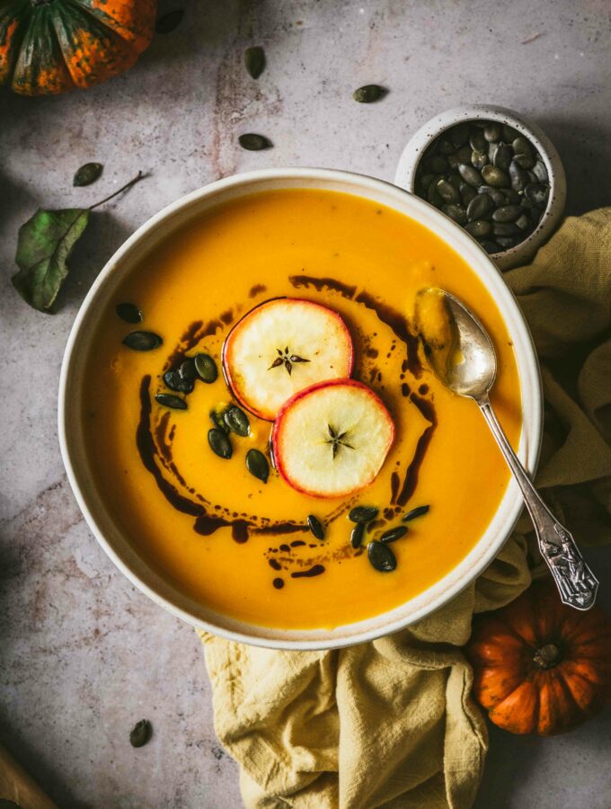 A bowl of creamy Apple Pumpkin Soup to brighten up the mood.