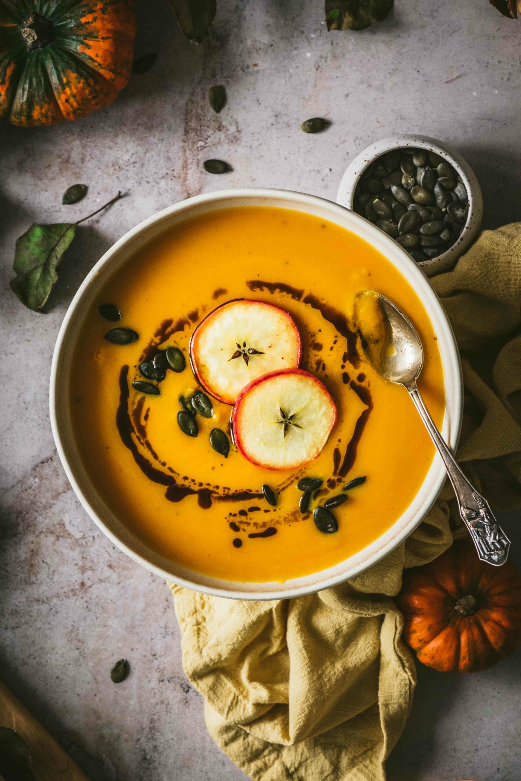 A bowl of creamy Apple Pumpkin Soup to brighten up the mood.