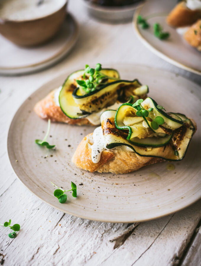 A crispy crostini topped with grilled, garlicky zucchini