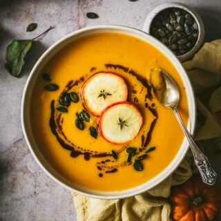 A bowl of creamy Apple Pumpkin Soup to brighten up the mood.